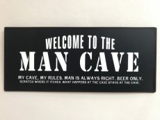 Tekstbord "Welcome to the man cave... "